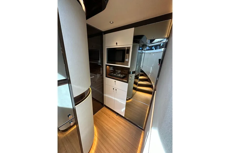 Baateaux Yacht Photos Pics Luxurious interior of 2024 Zeelander 5 yacht with modern design and wood flooring.