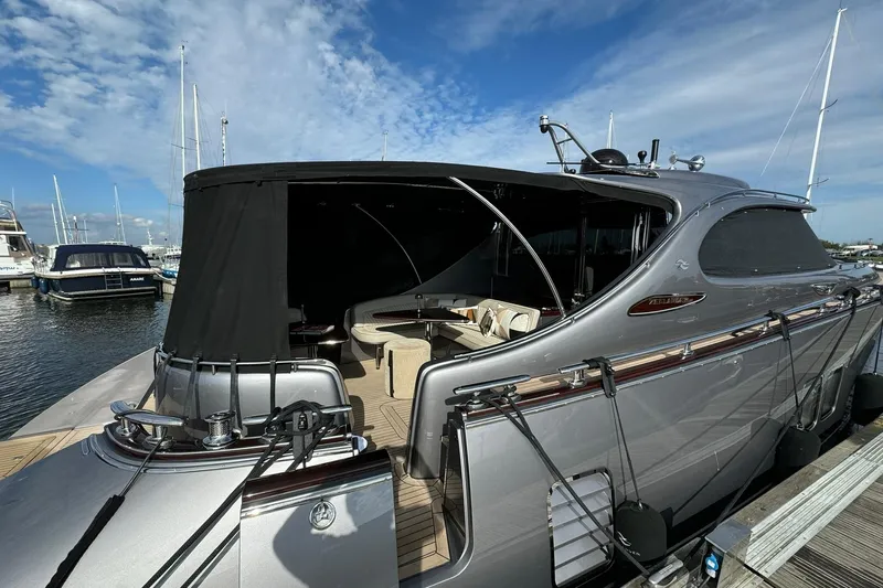 Baateaux Yacht Photos Pics 2024 Zeelander 5 yacht docked, showcasing sleek design and luxurious interior.