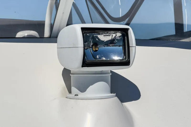 Lil' Breezy Yacht Photos Pics Close-up of a spotlight on a 2006 Riviera 33 Flybridge boat.