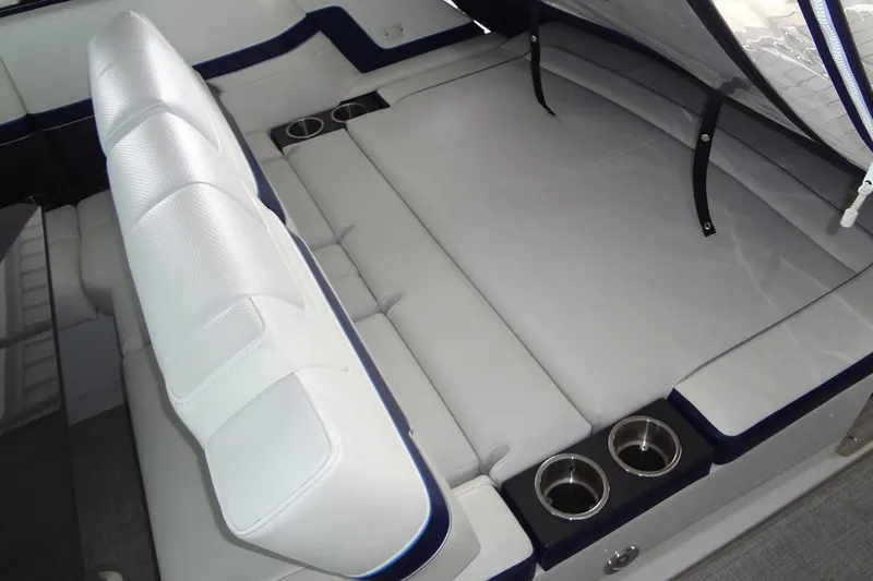 Master Plan Yacht Photos Pics 2023 Formula 380 Super Sport Crossover I/O interior with white seating and cup holders.