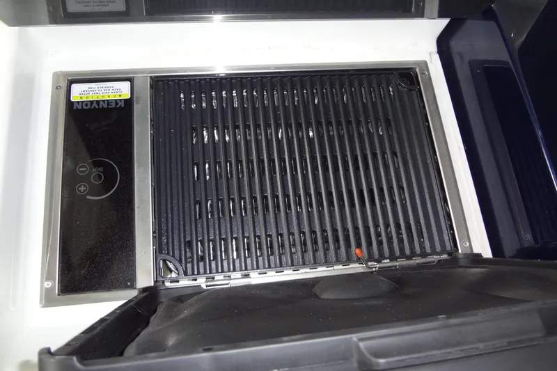Master Plan Yacht Photos Pics Kenyon grill on 2023 Formula 380 Super Sport Crossover I/O boat.