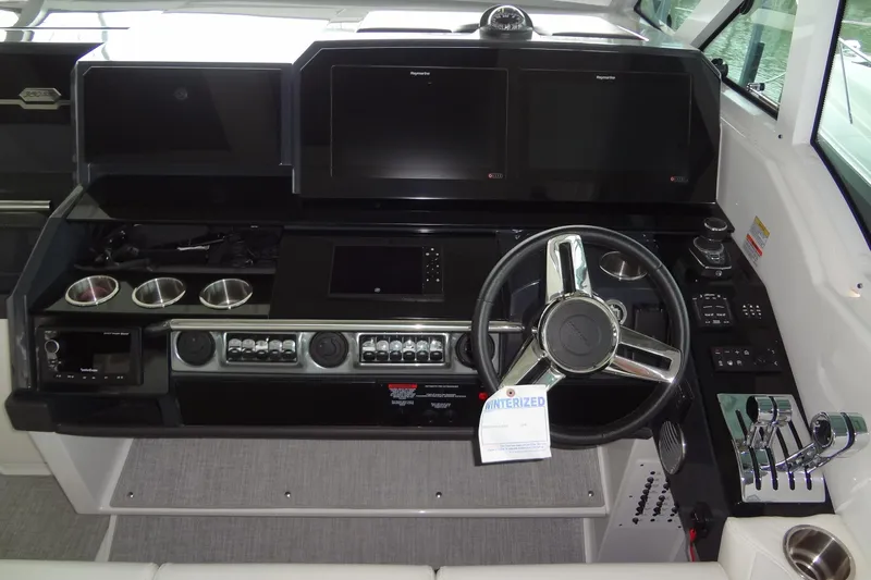 Master Plan Yacht Photos Pics 2023 Formula 380 Super Sport Crossover I/O helm with advanced controls and displays.