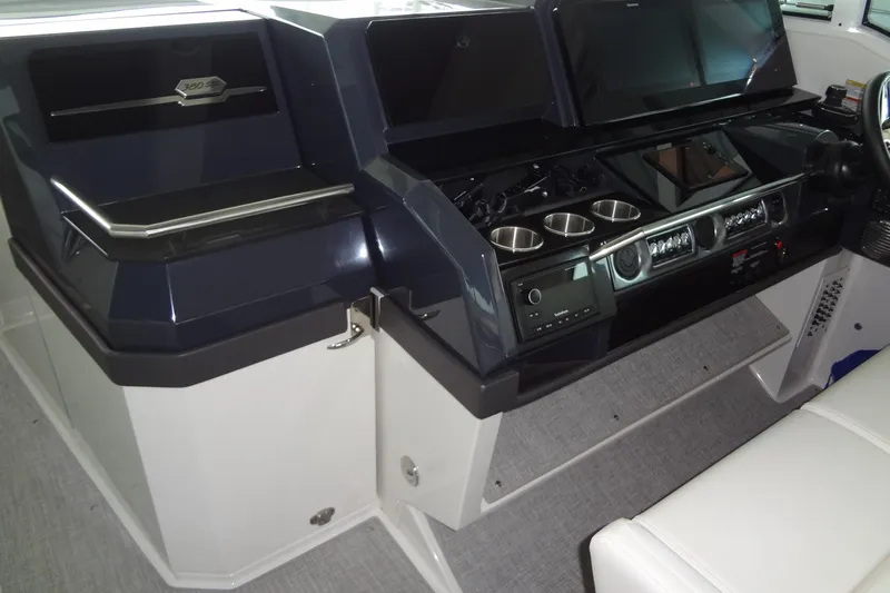 Master Plan Yacht Photos Pics 2023 Formula 380 Super Sport Crossover I/O dashboard with modern controls and cup holders.