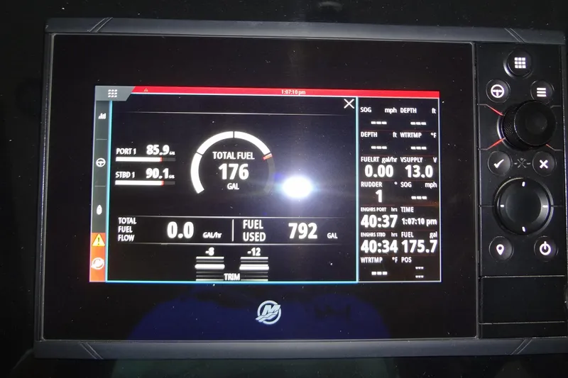 Master Plan Yacht Photos Pics Dashboard display of 2023 Formula 380 Super Sport Crossover I/O showing fuel and engine data.