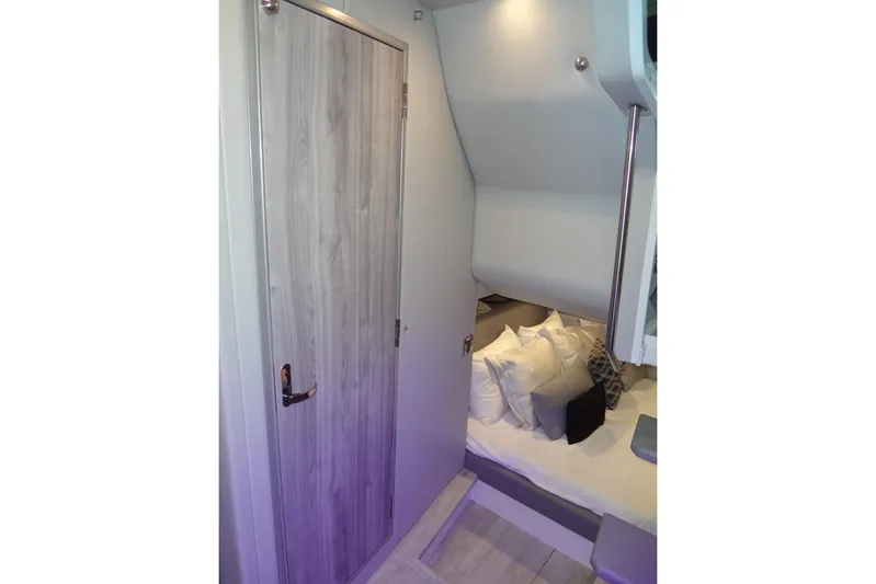 Master Plan Yacht Photos Pics 2023 Formula 380 Super Sport Crossover I/O cabin interior with modern design and cozy bedding.