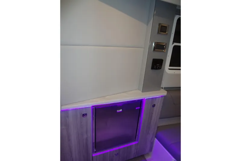 Master Plan Yacht Photos Pics Interior of 2023 Formula 380 Super Sport Crossover with modern lighting and control panel.