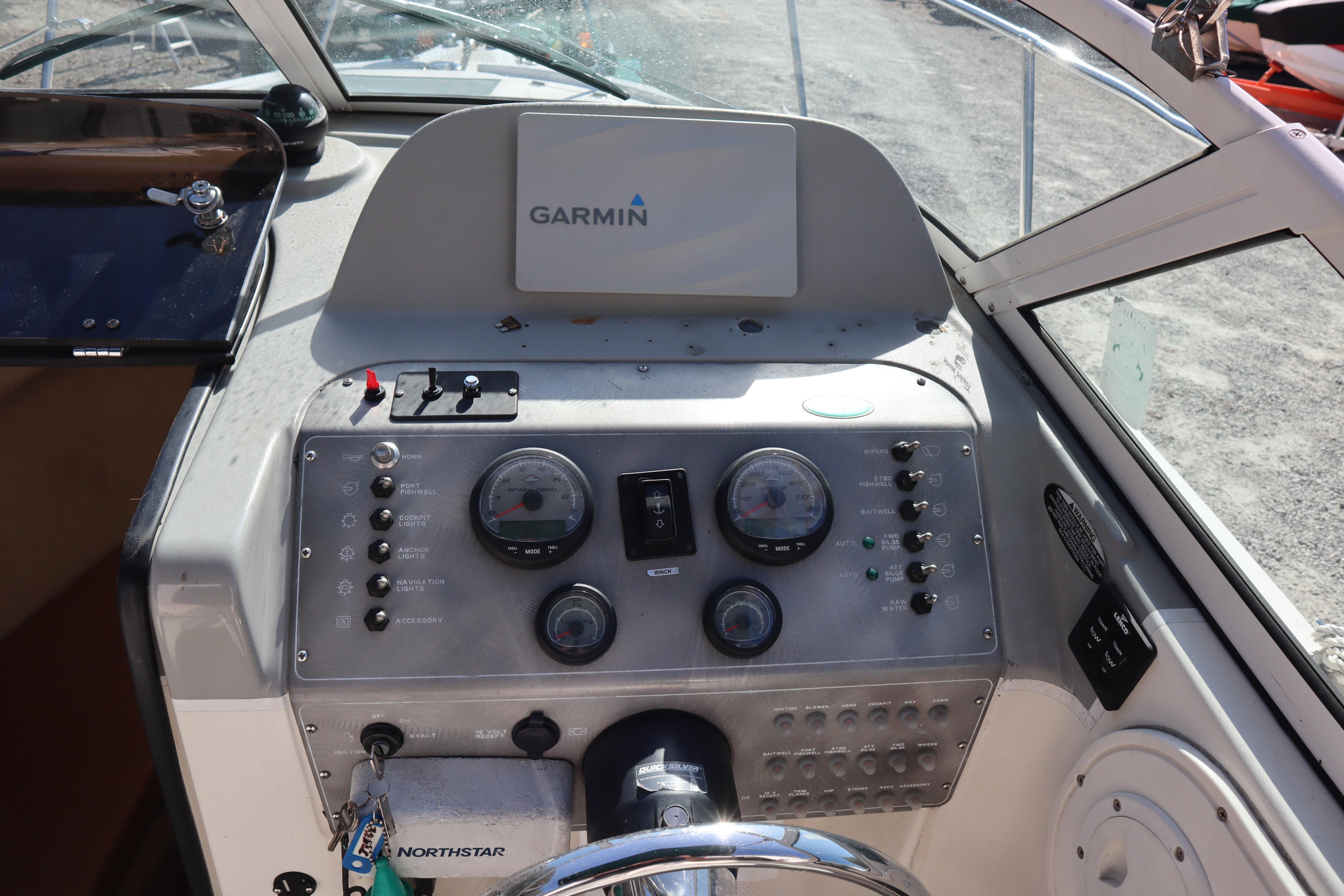 2008 Trophy 2102 Walkaround boat dashboard with Garmin navigation system.