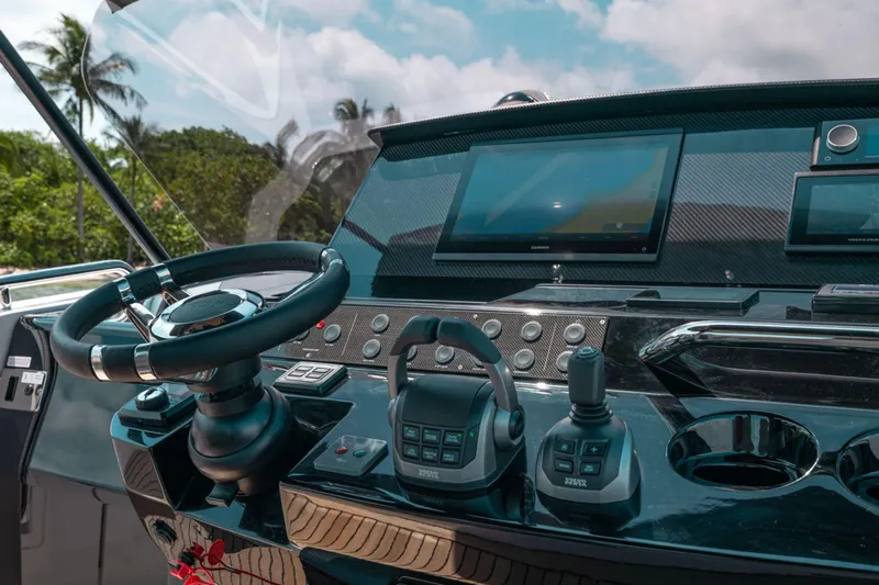 M/y Wavemoji Yacht Photos Pics Helm of 2022 Pardo Yachts 38 with modern controls and navigation screens.