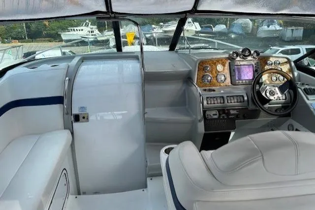  Yacht Photos Pics 2009 Formula 350 Sun Sport boat interior with modern dashboard and seating.