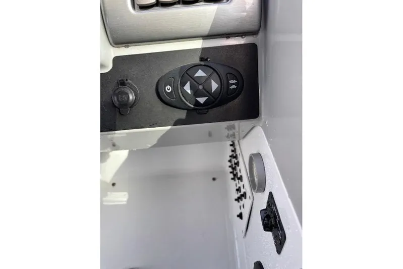  Yacht Photos Pics Control panel of a 2009 Formula 350 Sun Sport boat with navigation buttons.