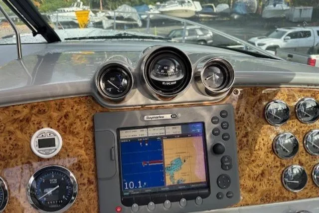  Yacht Photos Pics Dashboard of a 2009 Formula 350 Sun Sport boat with navigation system and gauges.