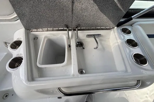  Yacht Photos Pics 2009 Formula 350 Sun Sport boat sink with cup holders and faucet.
