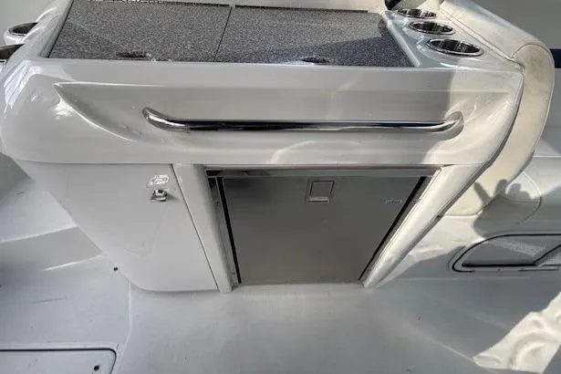  Yacht Photos Pics 2009 Formula 350 Sun Sport boat interior with sleek kitchenette and storage.