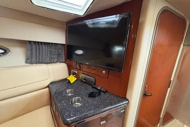  Yacht Photos Pics Interior of 2009 Formula 350 Sun Sport with TV and kitchenette area.