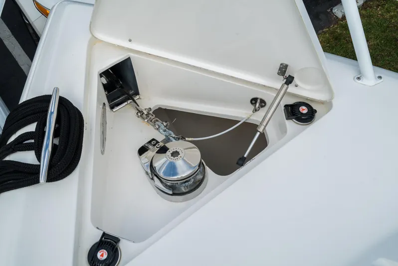  Yacht Photos Pics 2010 Intrepid 370 Cuddy anchor locker with windlass and rope storage.