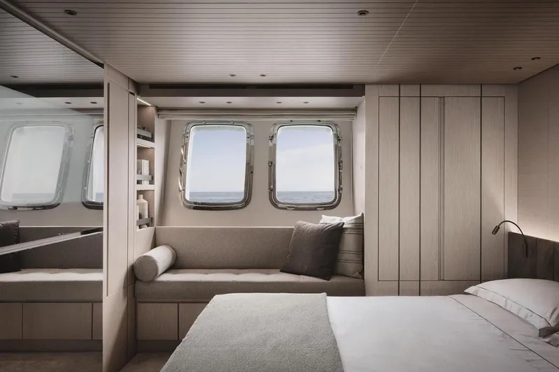  Yacht Photos Pics Luxurious 2024 Sanlorenzo SX76 yacht cabin with modern design and ocean view windows.