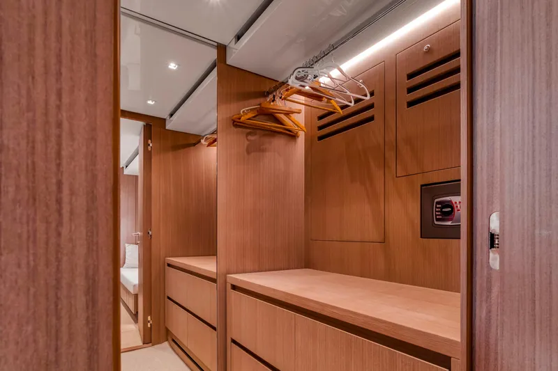  Yacht Photos Pics Luxurious wooden closet interior in 2024 Sanlorenzo SX76 yacht.