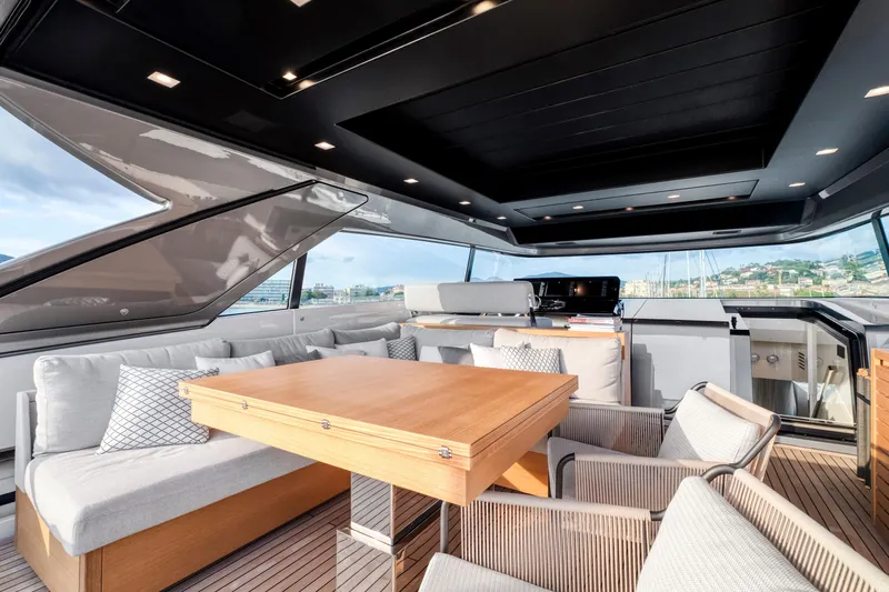  Yacht Photos Pics Luxurious 2024 Sanlorenzo SX76 yacht interior with elegant seating and modern design.