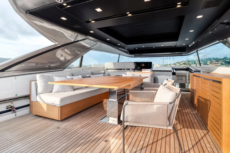  Yacht Photos Pics Luxurious 2024 Sanlorenzo SX76 yacht interior with elegant seating and modern design.