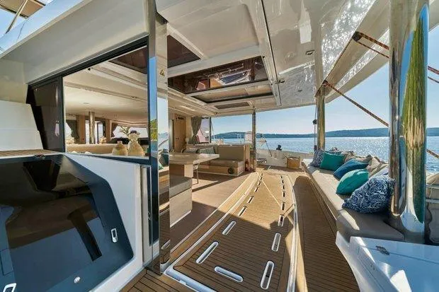 Joža Yacht Photos Pics Luxurious 2024 Bali 5.4 yacht interior with spacious seating and ocean view.