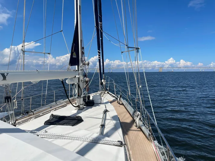 Bearaway Yacht Photos Pics Sailing on 1985 Amel Maramu yacht under clear blue skies and calm sea.