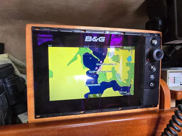 Bearaway Yacht Photos Pics B&G marine navigation system on 1985 Amel Maramu sailboat, displaying a colorful nautical chart.