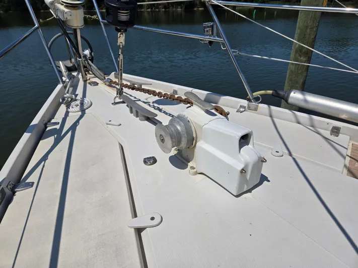 Bearaway Yacht Photos Pics Deck of 1985 Amel Maramu sailboat with anchor windlass and chain.