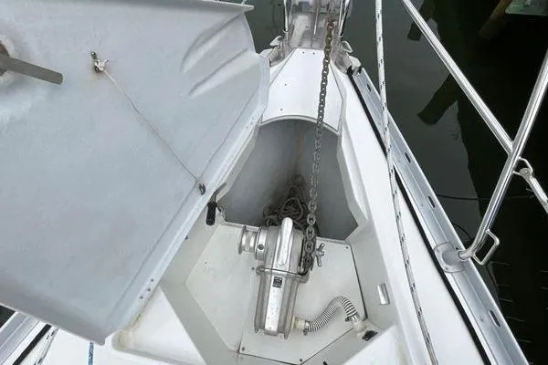 Ligera Yacht Photos Pics Anchor locker of 2002 Jeanneau Sun Odyssey 45.2 sailboat with chain and windlass.