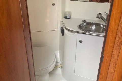 Ligera Yacht Photos Pics 2002 Jeanneau Sun Odyssey 45.2 yacht bathroom with sink and toilet.