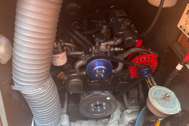 Ligera Yacht Photos Pics Engine compartment of a 2002 Jeanneau Sun Odyssey 45.2 sailboat, showing mechanical components.