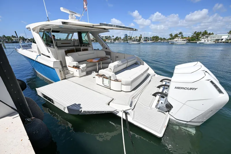  Yacht Photos Pics 2023 Tiara Yachts 48 LS luxury boat with spacious deck and powerful Mercury engines.