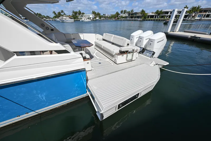  Yacht Photos Pics 2023 Tiara Yachts 48 LS luxury boat with spacious deck and powerful engines.