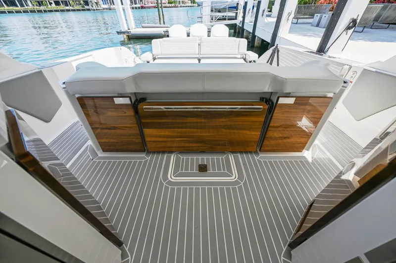  Yacht Photos Pics 2023 Tiara Yachts 48 LS luxury yacht interior with sleek wood and modern design.