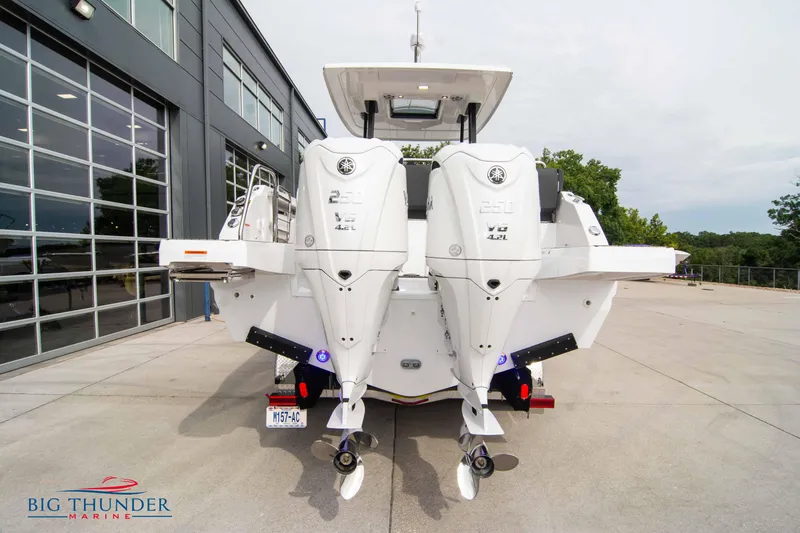  Yacht Photos Pics 2024 Jeanneau Leader 9.0 WA boat with dual engines at marina.