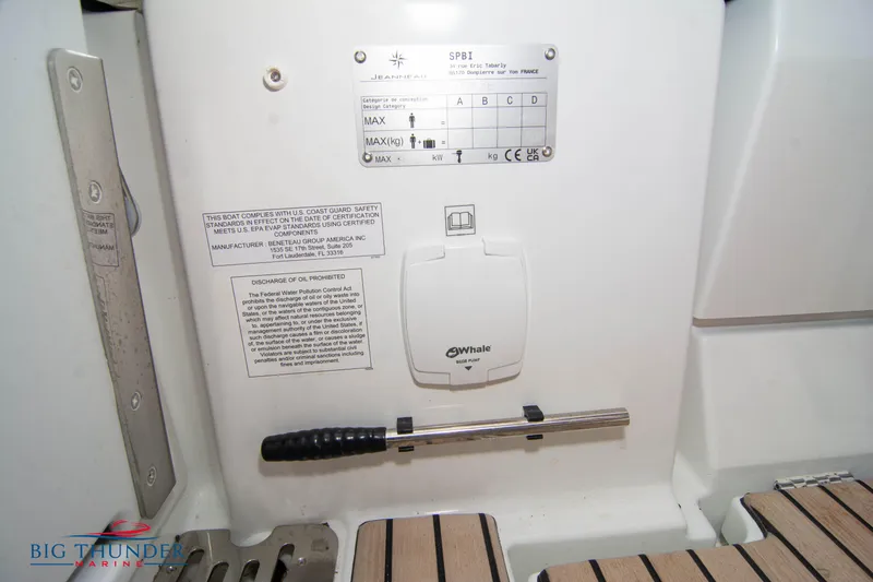  Yacht Photos Pics 2024 Jeanneau Leader 9.0 WA boat interior with control panel and safety instructions.