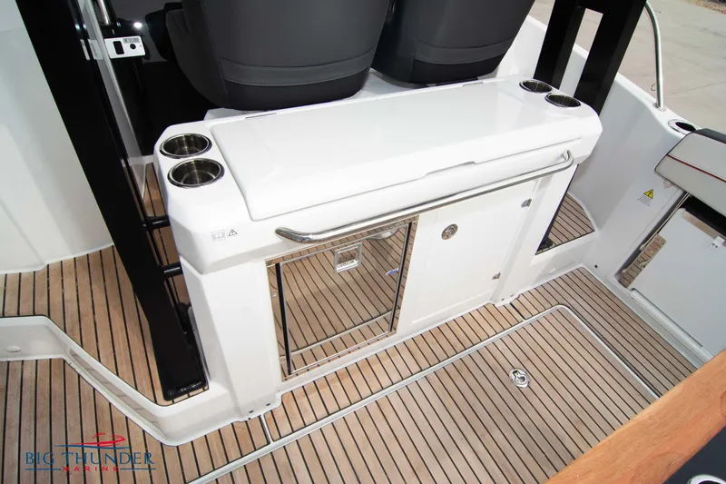  Yacht Photos Pics 2024 Jeanneau Leader 9.0 WA boat interior with sleek design and wood flooring.