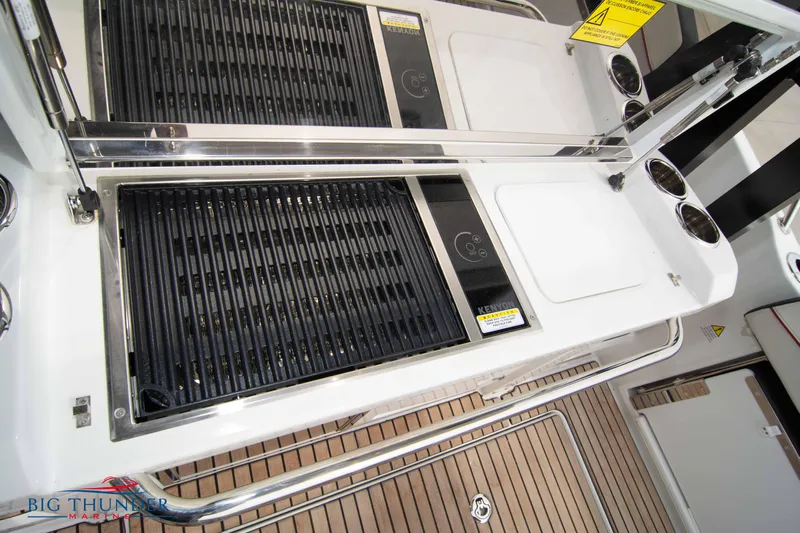  Yacht Photos Pics 2024 Jeanneau Leader 9.0 WA boat deck with grill and sink.