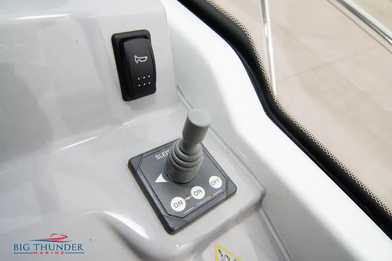  Yacht Photos Pics Joystick control panel on 2024 Jeanneau Leader 9.0 WA boat dashboard.