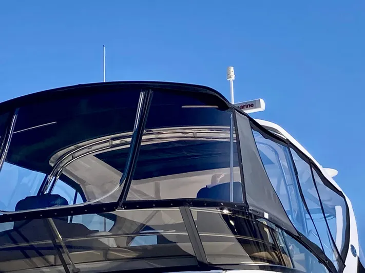  Yacht Photos Pics 2018 Sea Ray Fly 510 yacht with sleek design against clear blue sky.