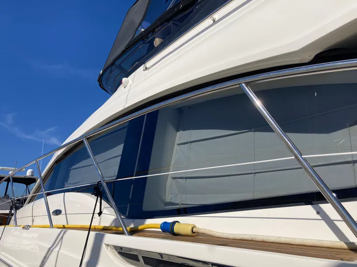  Yacht Photos Pics 2018 Sea Ray Fly 510 yacht with sleek design and chrome railings.