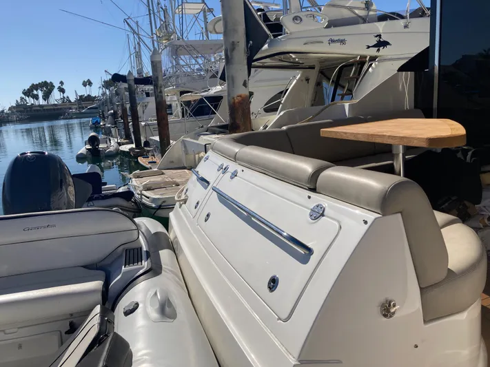  Yacht Photos Pics 2018 Sea Ray Fly 510 yacht docked at marina, featuring sleek design and luxurious seating.