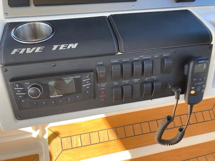  Yacht Photos Pics Control panel of 2018 Sea Ray Fly 510 yacht with radio and switches.