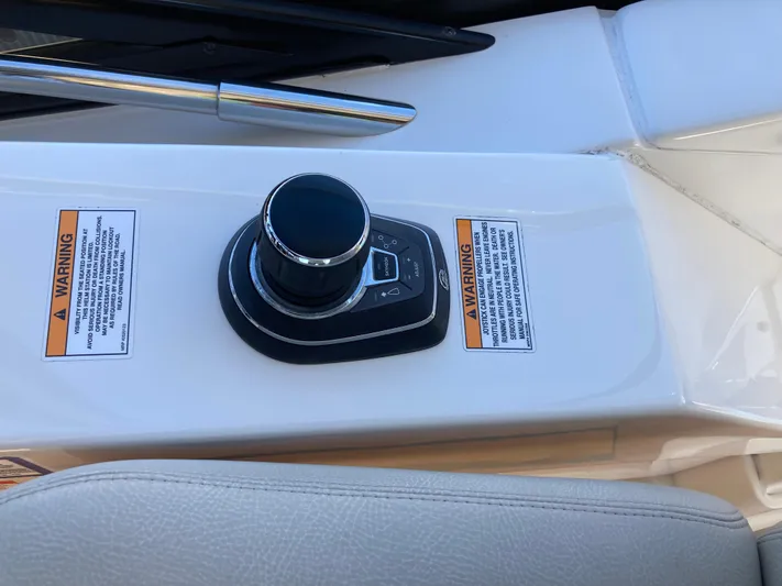  Yacht Photos Pics 2018 Sea Ray Fly 510 control panel with joystick and warning labels.