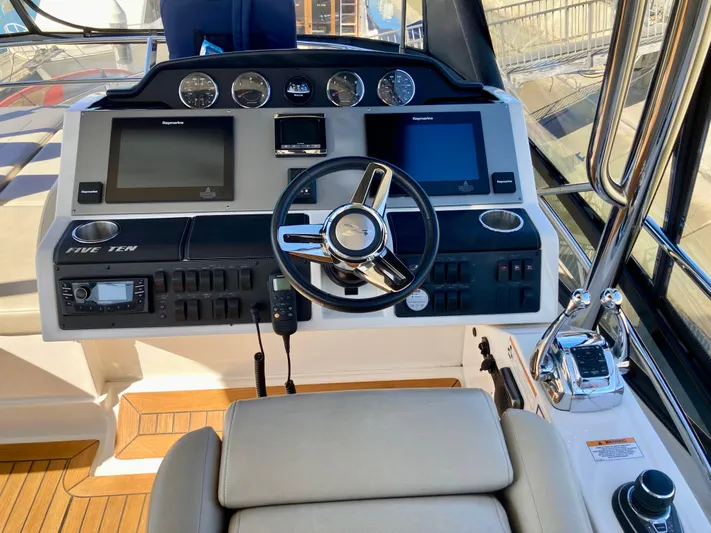  Yacht Photos Pics 2018 Sea Ray Fly 510 helm with modern navigation controls and steering wheel.