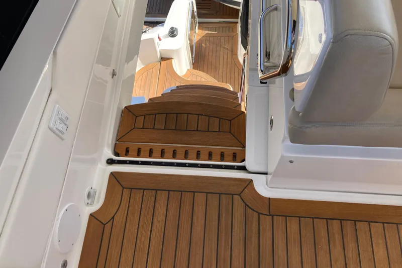  Yacht Photos Pics 2018 Sea Ray Fly 510 yacht interior with teak flooring and seating.