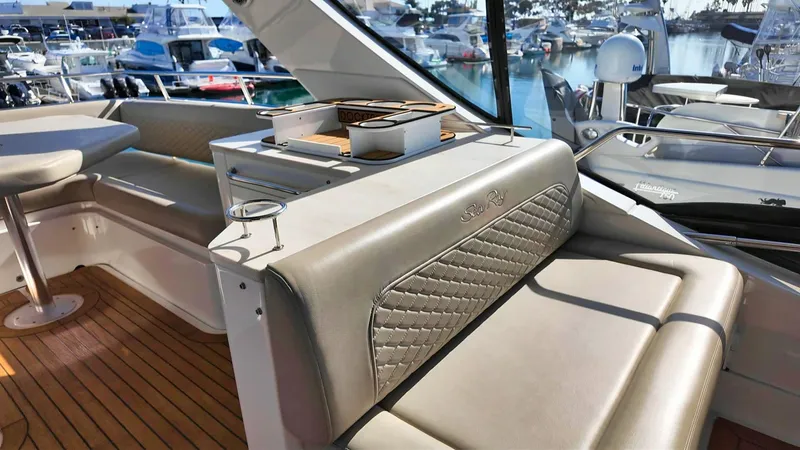  Yacht Photos Pics Luxurious 2018 Sea Ray Fly 510 yacht interior with elegant seating and marina view.