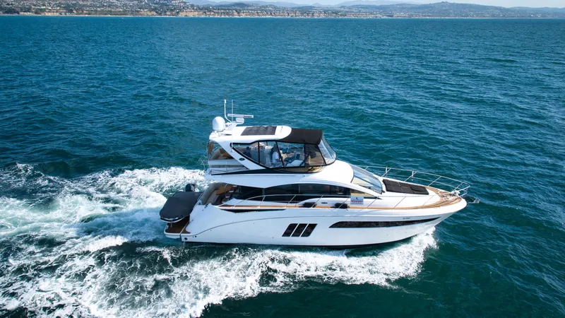  Yacht Photos Pics 2018 Sea Ray Fly 510 yacht cruising on open water.
