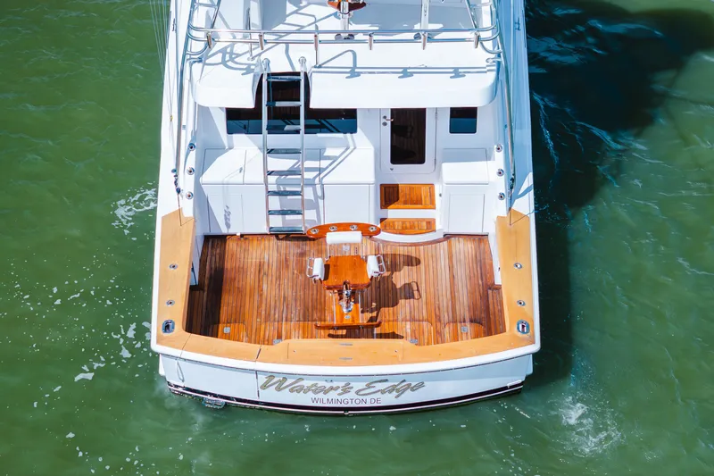 Water's Edge Yacht Photos Pics 2005 Hatteras Convertible 60 yacht with wooden deck, Wilmington DE.