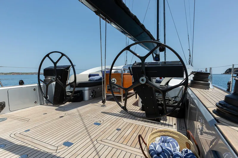 Caiarossa Yacht Photos Pics Luxurious 2009 Shipman 72 yacht deck with dual steering wheels and ocean view.