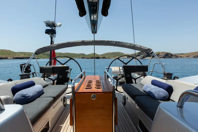 Caiarossa Yacht Photos Pics Luxurious 2009 Shipman 72 yacht interior with dual steering wheels and scenic ocean view.